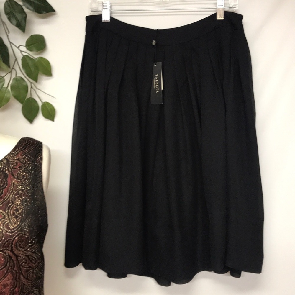 Silk black skirt.